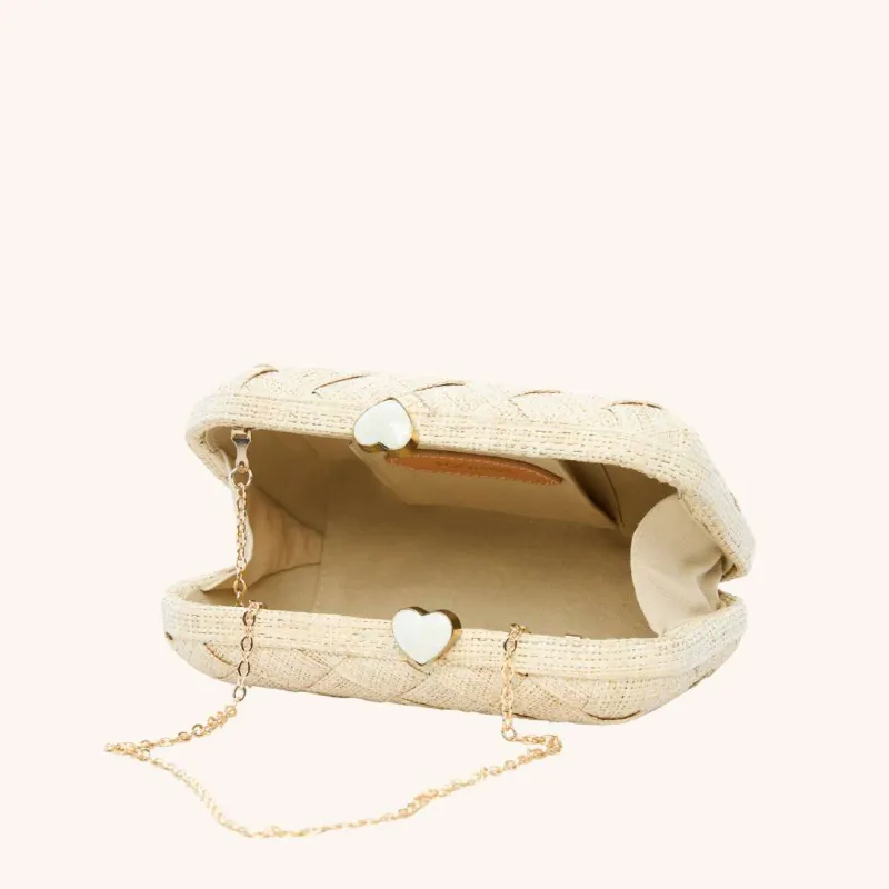 The Love Heart Clutch sold by Poolside