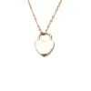 14k Padlock Heart Necklace sold by RG