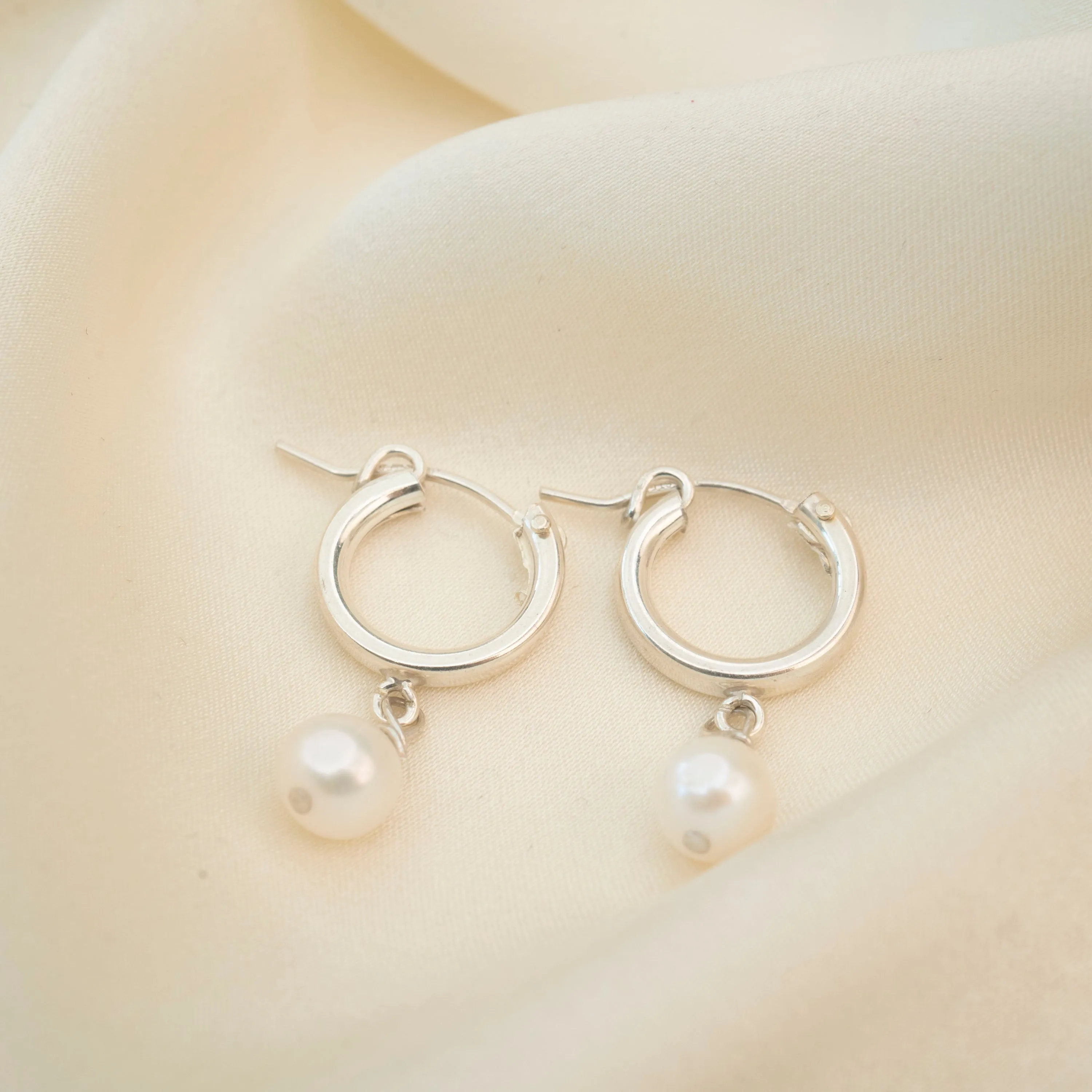 Silver Pearl Clasp Hoops sold by RG