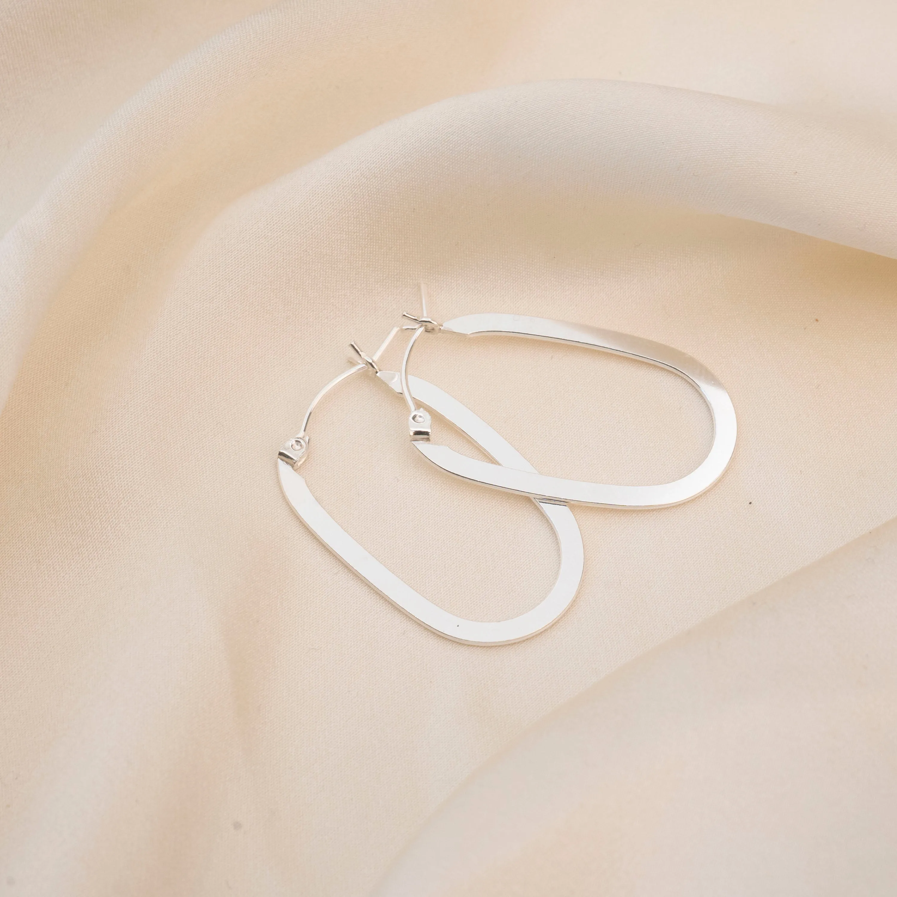 Silver Flat Shape Oval Hoops sold by RG product image thumbnail 4