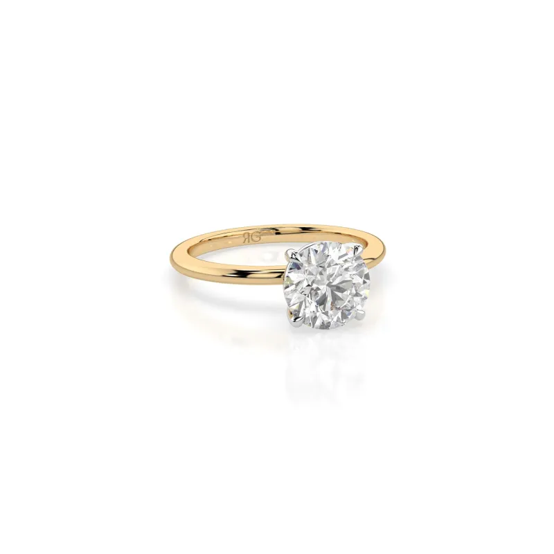 14k Round Solitaire Ring sold by RG