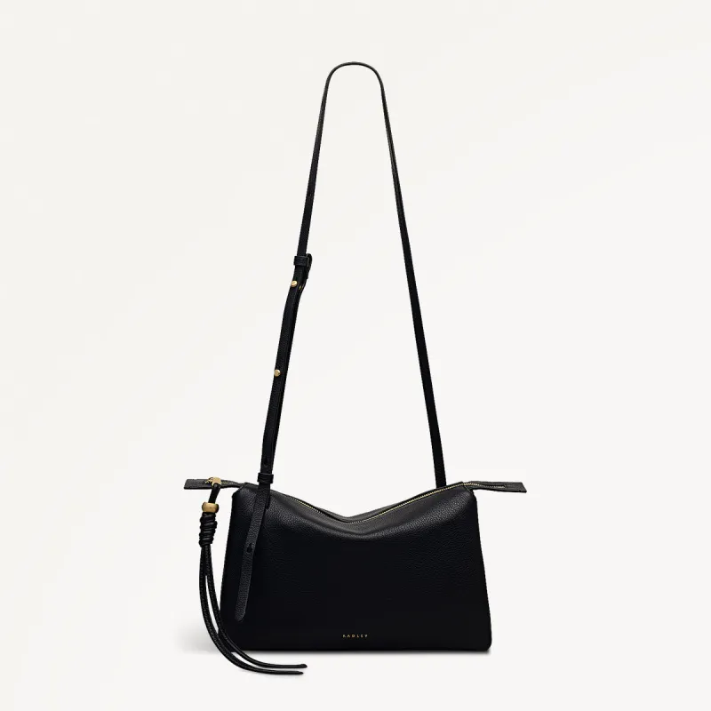 The Romilly Leather Medium Ziptop Cross Body Bag in Black - 112275 sold by Radley