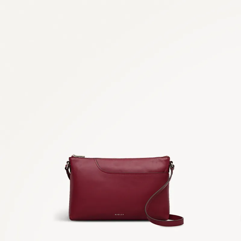 Pockets Leather Medium Ziptop Ew Cross Body Bag in Carmine - 112239 sold by Radley