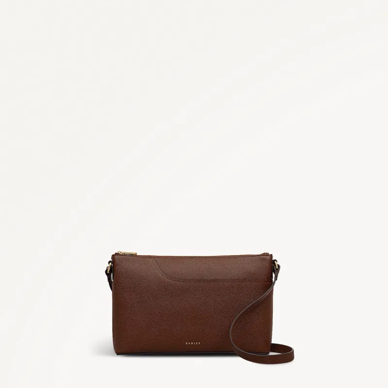 Pockets Leather Medium Ziptop Ew Cross Body Bag in Chocolate - 112141 sold by Radley