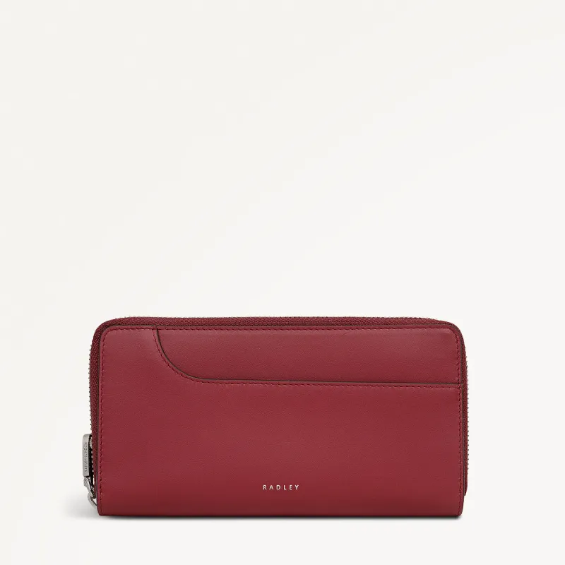 Pockets Leather Large Zip Around Wallet in Carmine - 112070 sold by Radley