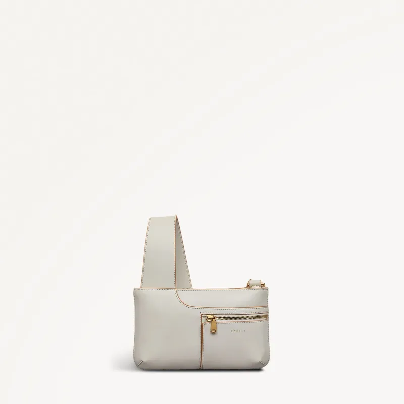 Pockets Leather Mini Ziptop Cross Body Bag in Chalk - 111430 sold by Radley