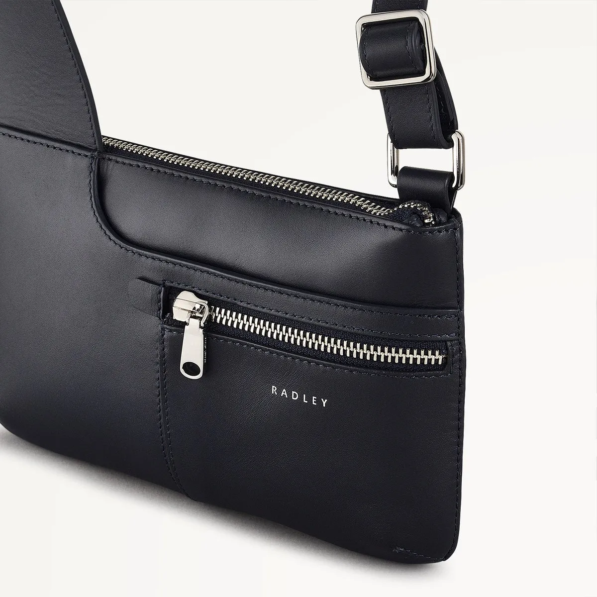 Pockets Leather Mini Ziptop Crossbody Bag in Ink - 110433 sold by Radley product image thumbnail 3