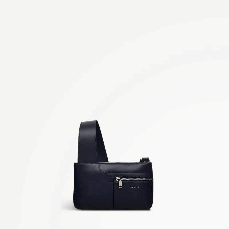 Pockets Leather Mini Ziptop Crossbody Bag in Ink - 110433 sold by Radley