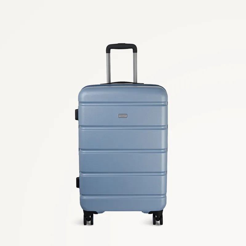 Lexington - Colour 4 Wheel Medium Suitcase Pale Denim - 113601 sold by Radley