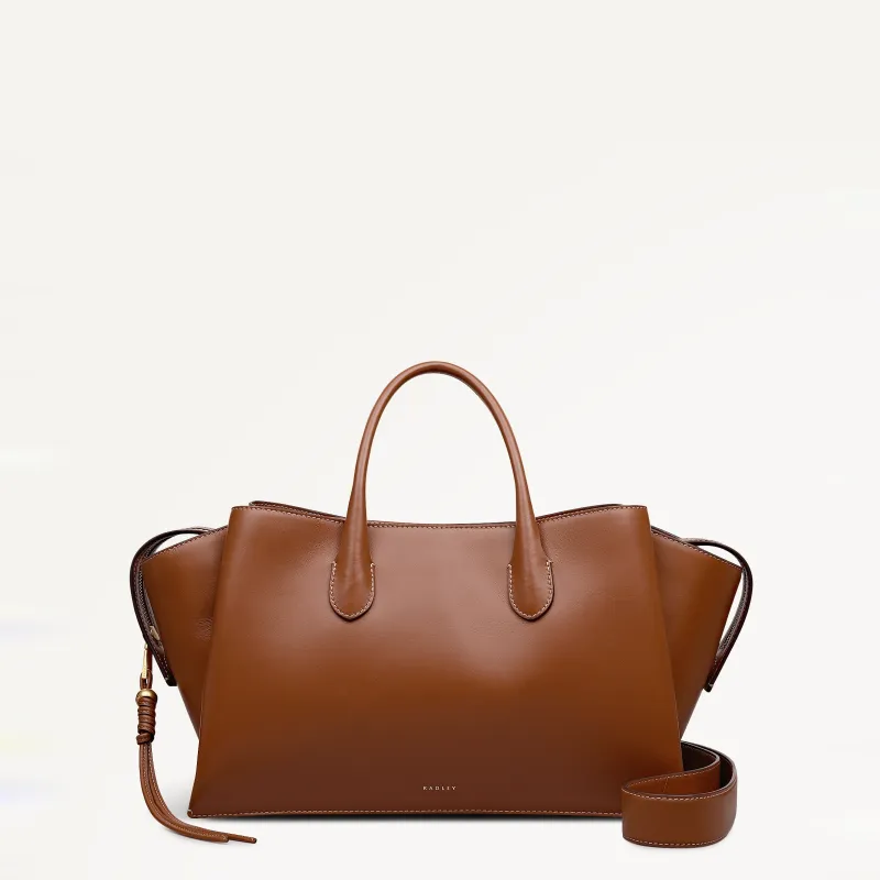 The Romilly Large Ziptop Grab Cognac - 113488 sold by Radley