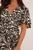 Black Abstract Print Frill Detail Playsuit - Bela sold by Rebellious Fashion