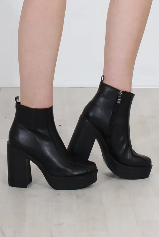 Rheta Black PU platform ankle boots sold by Rebellious Fashion