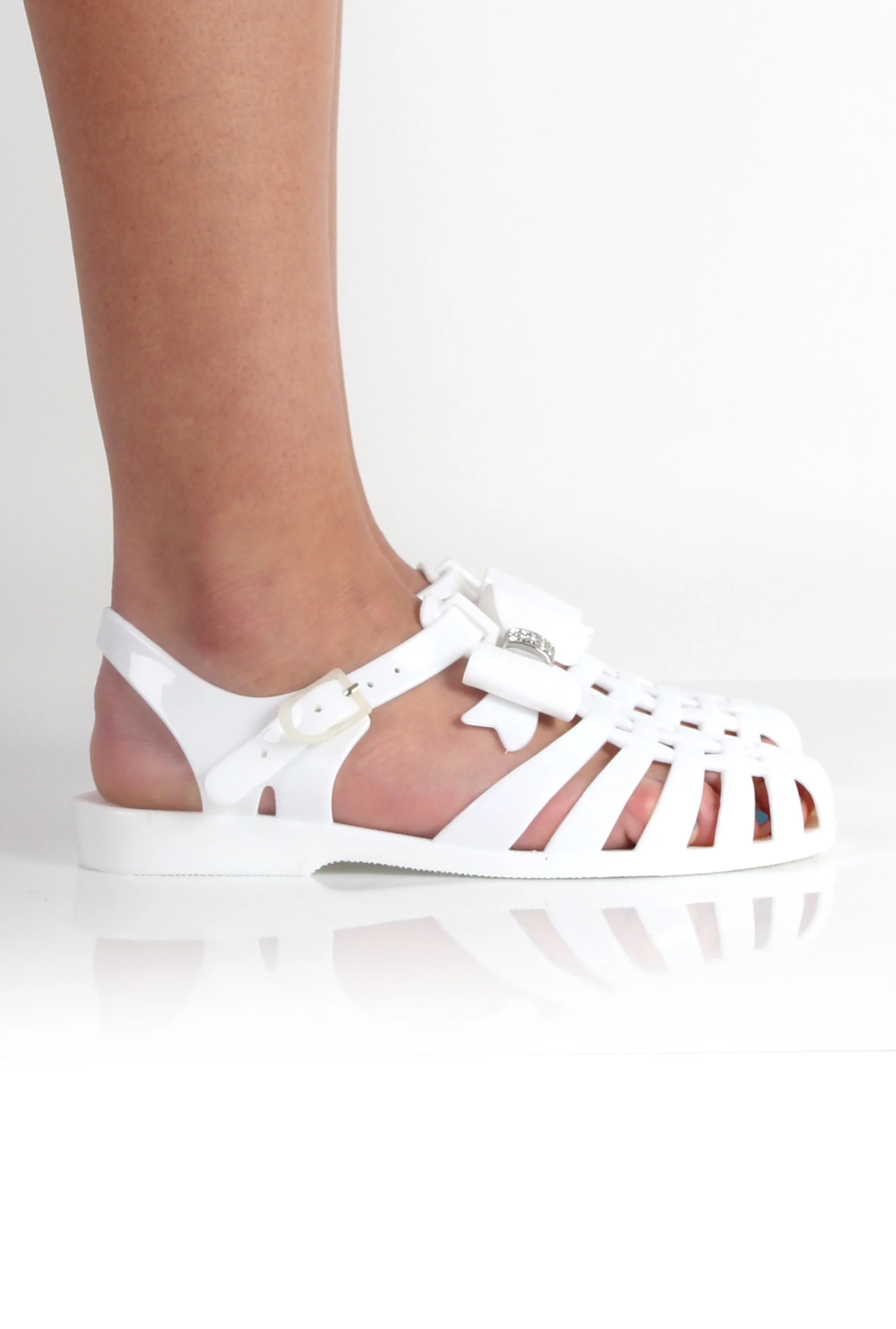 Lily White Bow Diamante Jelly Shoes sold by Rebellious Fashion