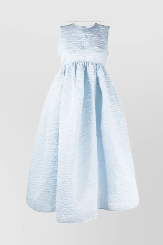 Sleeveless matelassé maxi dress sold by Renaisa