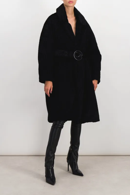 Oversized belted midi coat sold by Renaisa