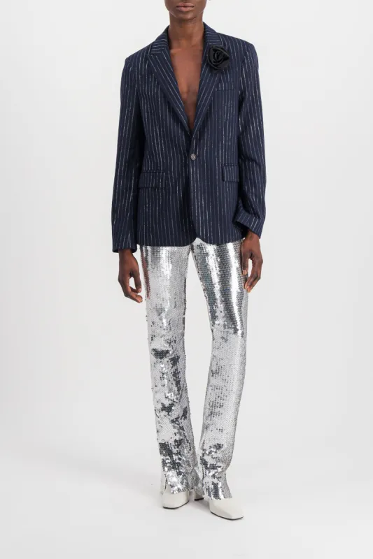 Embroidered sequins flared pants sold by Renaisa