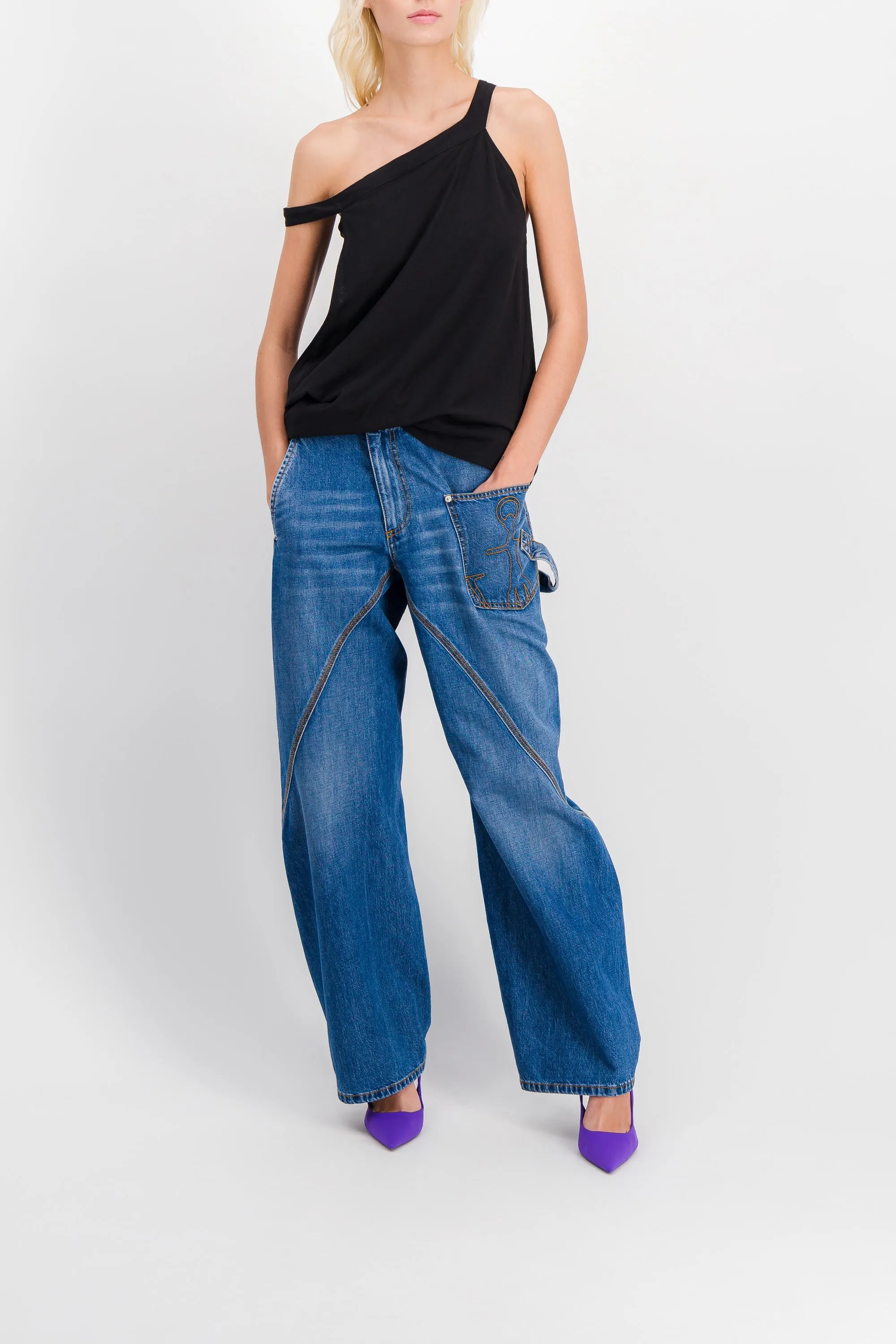 Asymmetric draped top sold by Renaisa