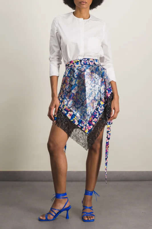 Mix mesh flower printed asymmetric mini skirt sold by Renaisa