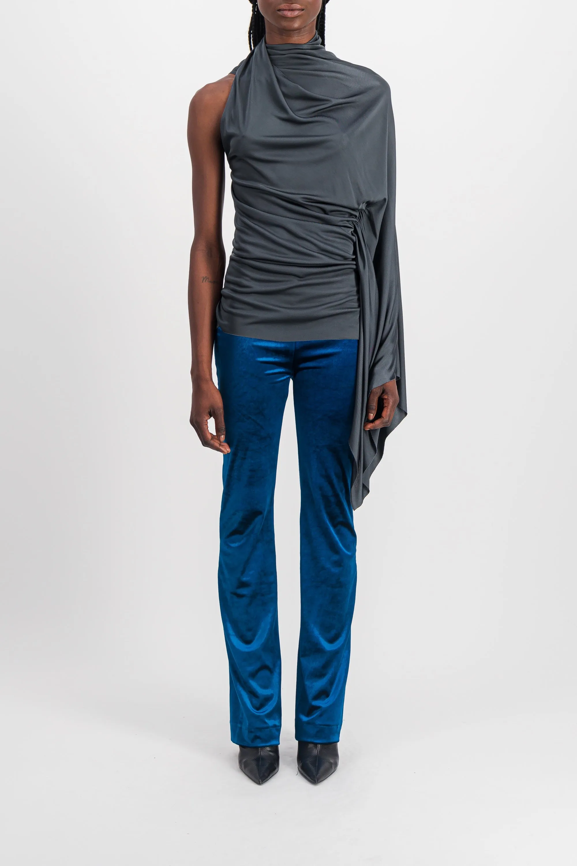 One sleeve draped shiny top sold by Renaisa