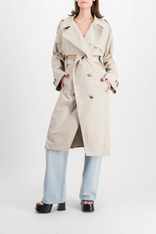 Twisted cut-out trench coat made by Coperni Paris