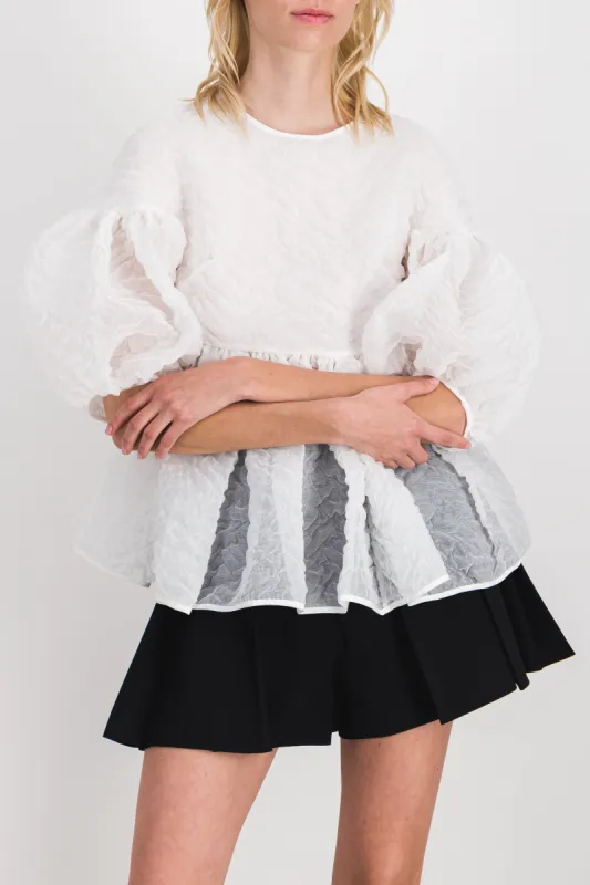 Matelassé drop shoulder top with puff sleeves sold by Renaisa