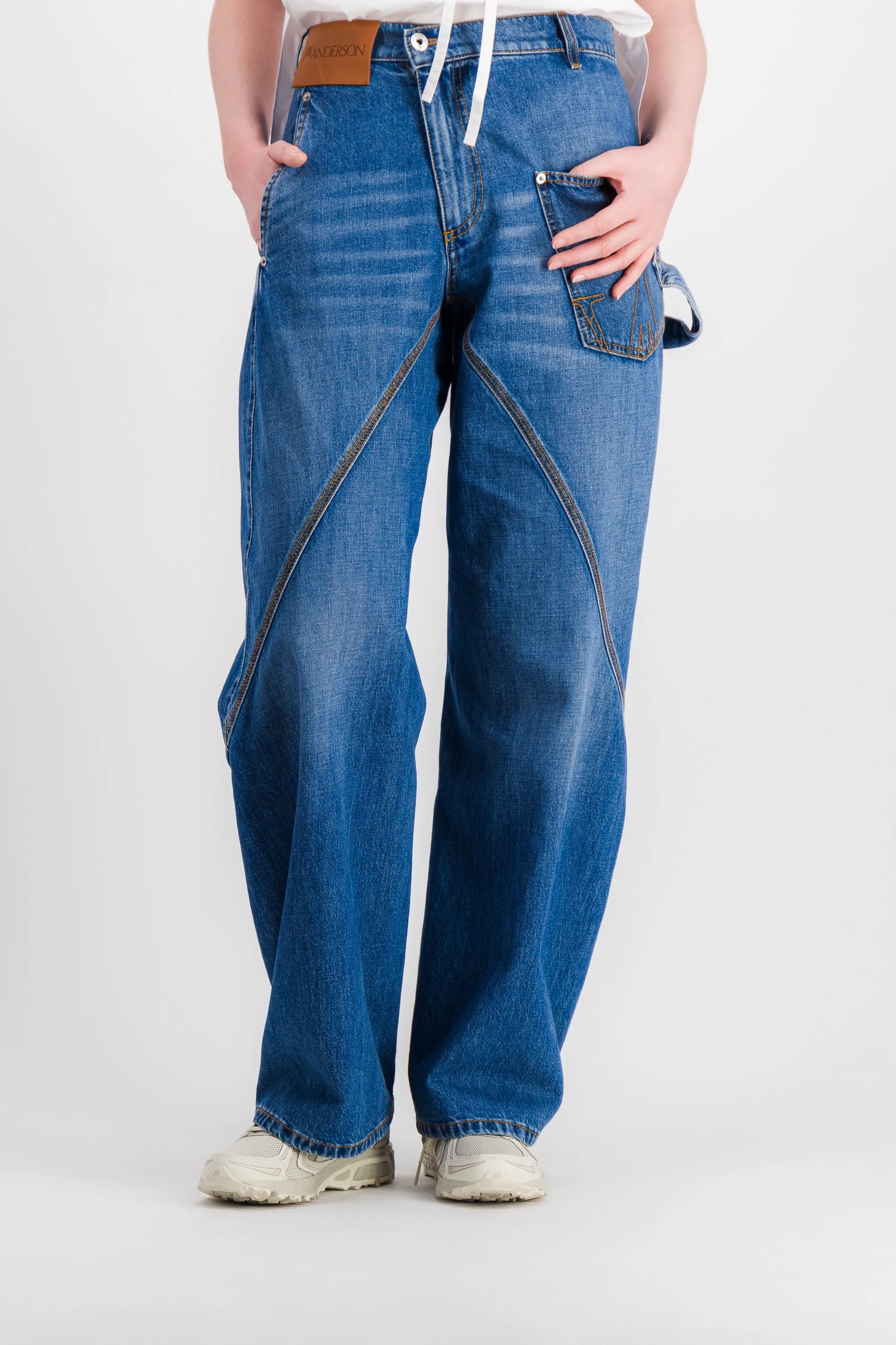 Light blue twisted workwear jeans sold by Renaisa