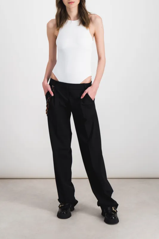 Low rise loose tailored pants sold by Renaisa