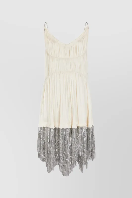 Pleated satin mesh mix mini dress sold by Renaisa