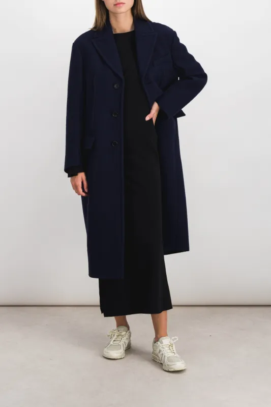 Felted bouclé wool long coat sold by Renaisa