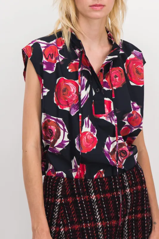 Sleeveless funnel neck flower printed top sold by Renaisa