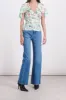 Printed light satin fluid top sold by Renaisa