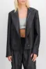 Double buttoned tailoring veste with high neck sold by Renaisa