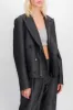 Double buttoned tailoring veste with high neck sold by Renaisa