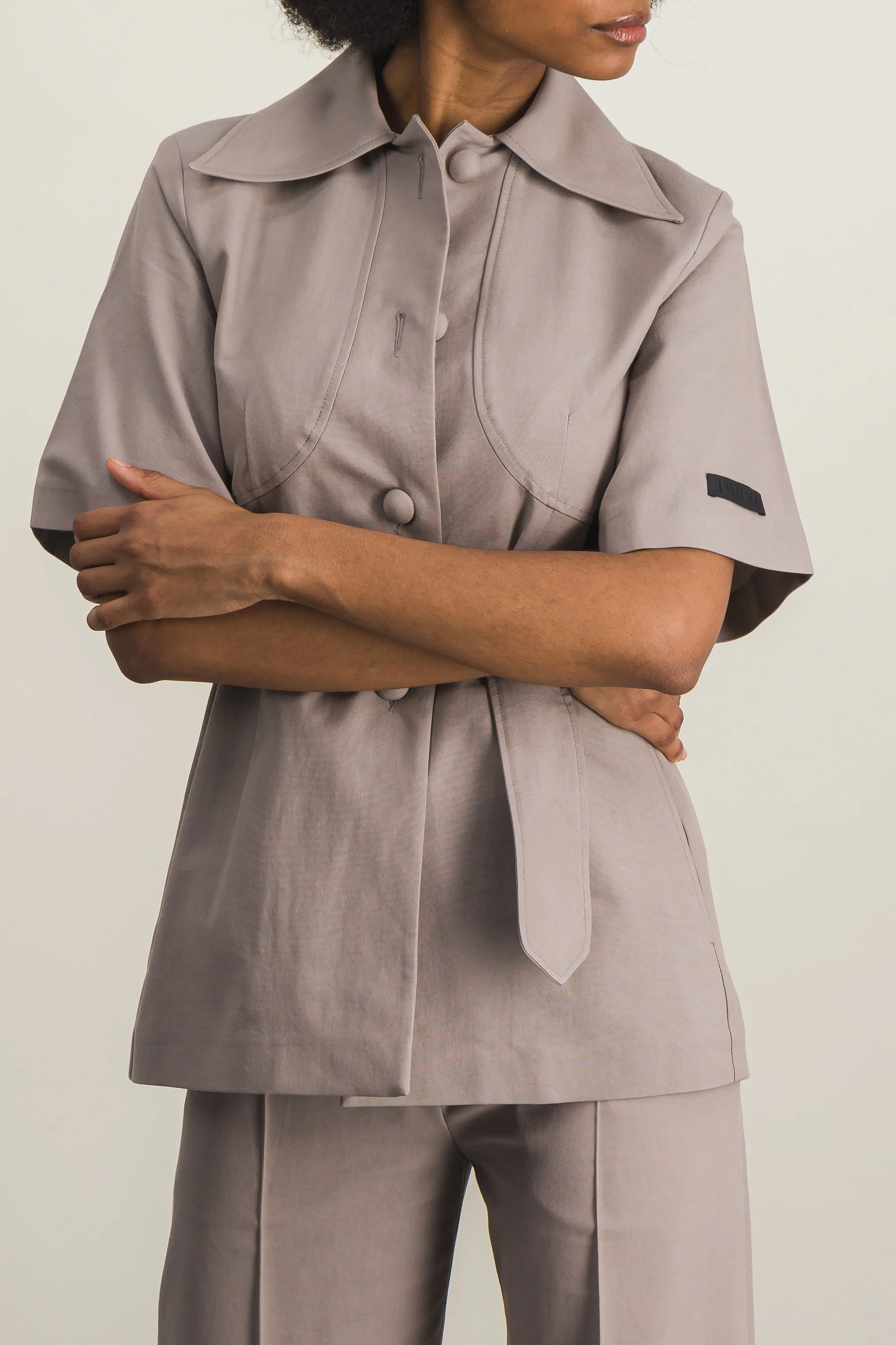 Organic cotton and wool short sleeved belted jacket sold by Renaisa