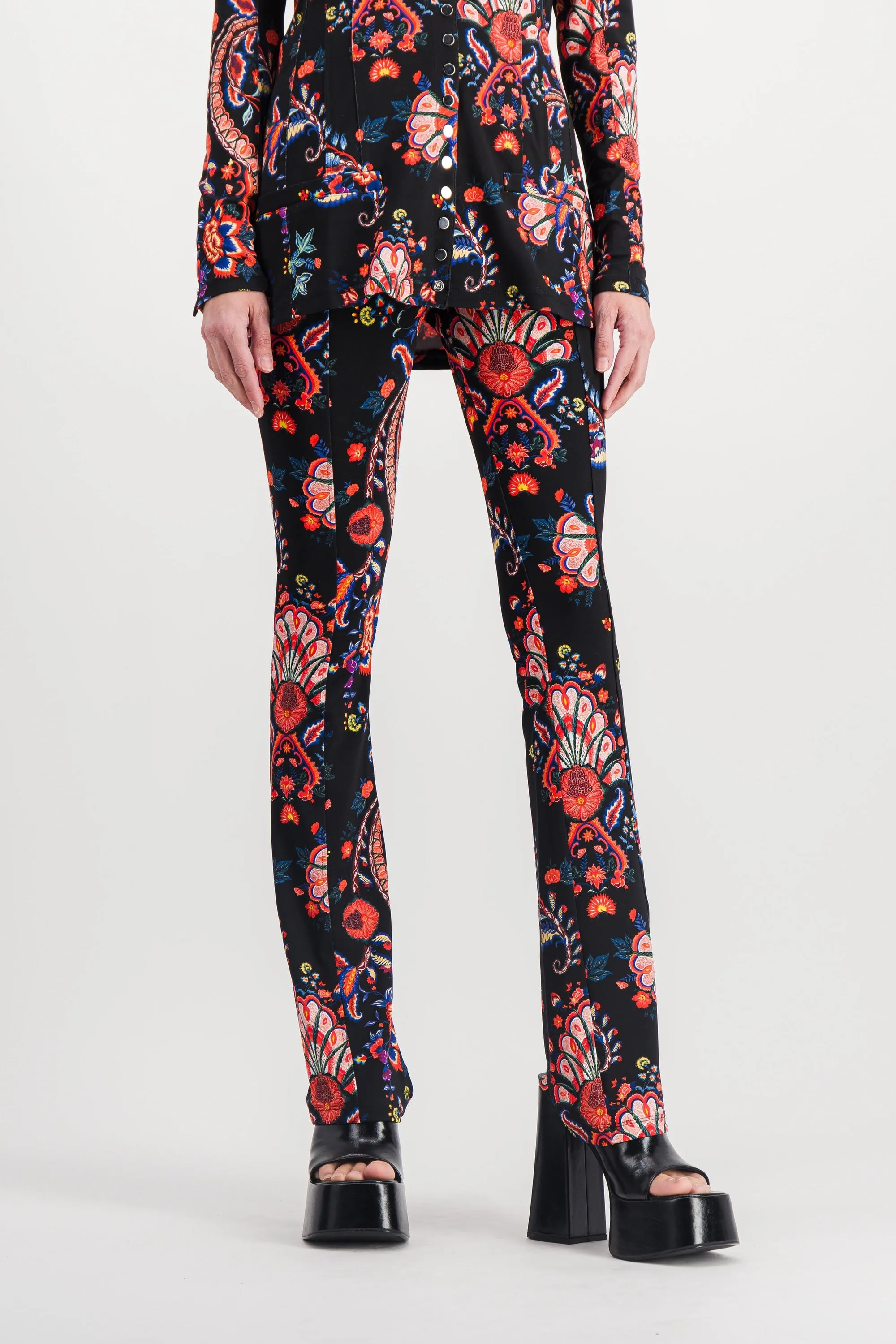 Paisley printed skinny straight leg pants sold by Renaisa