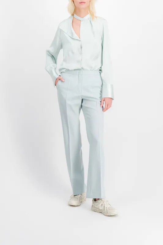 Fluid asymmetric silk light blue shirt sold by Renaisa