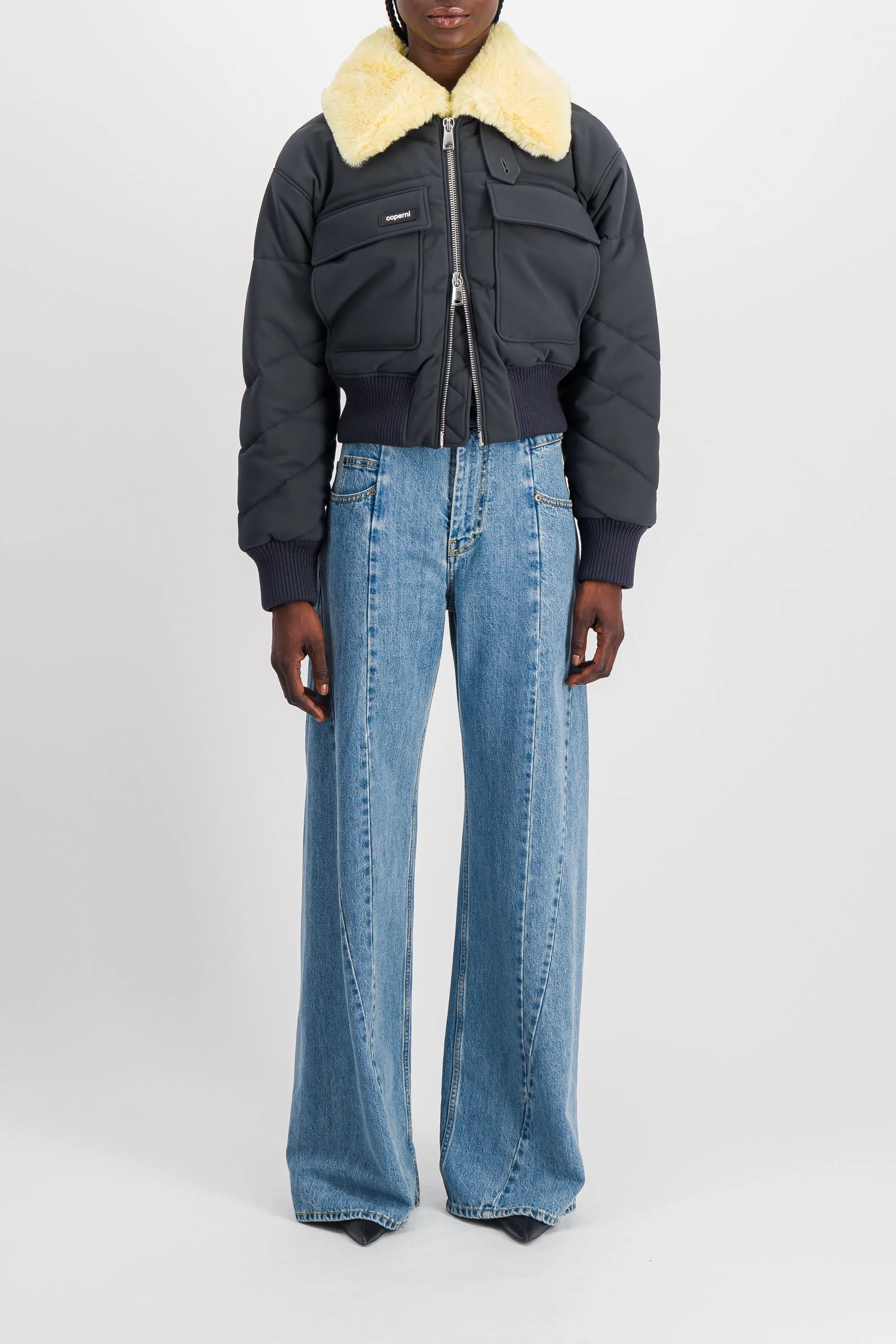 Extra wide leg blue denim jeans with cut-out belt sold by Renaisa