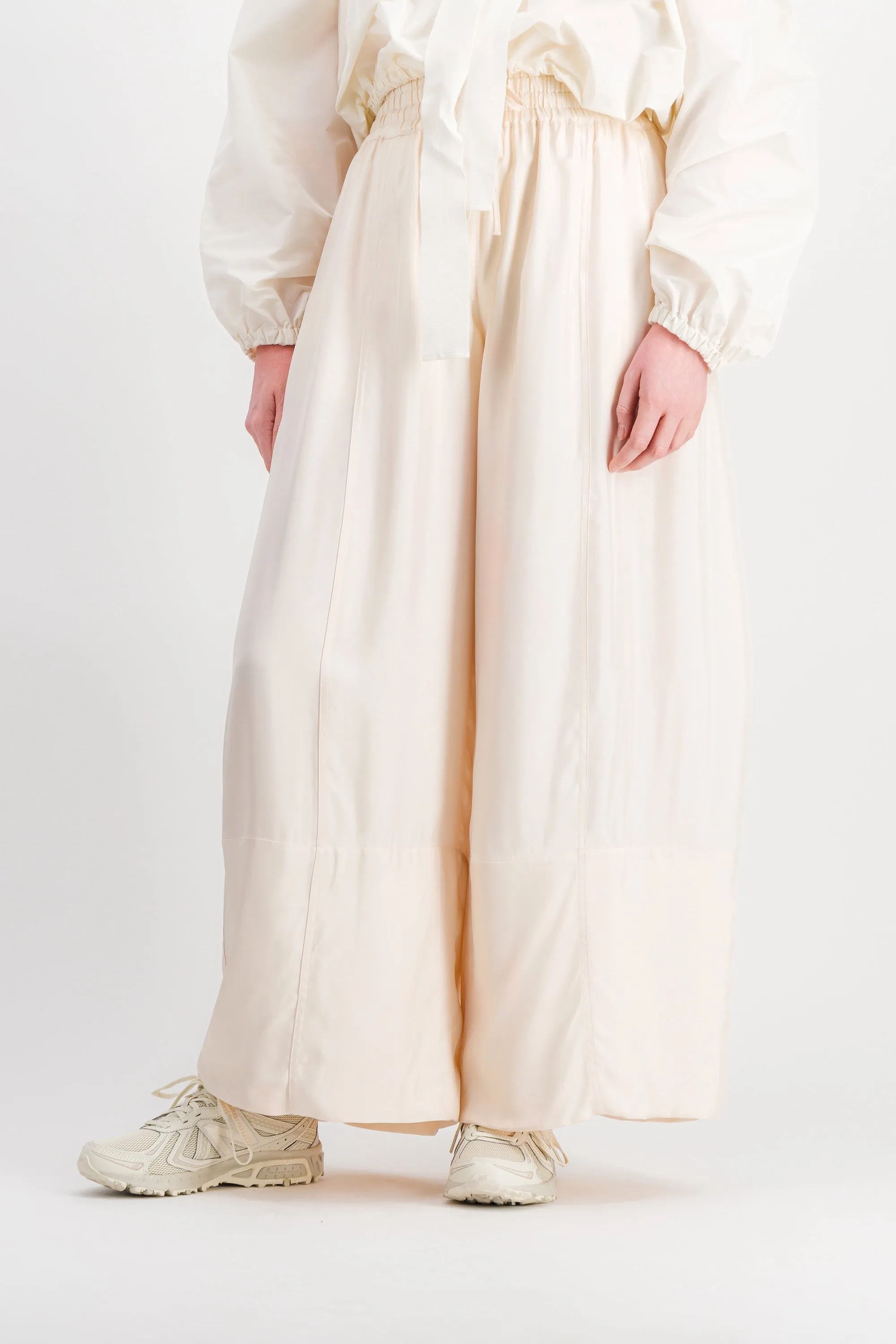 Ivory extra wide leg pants in fluid washed viscose with drawstring wide belt sold by Renaisa