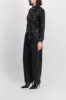 Slim washed black denim jacket sold by Renaisa