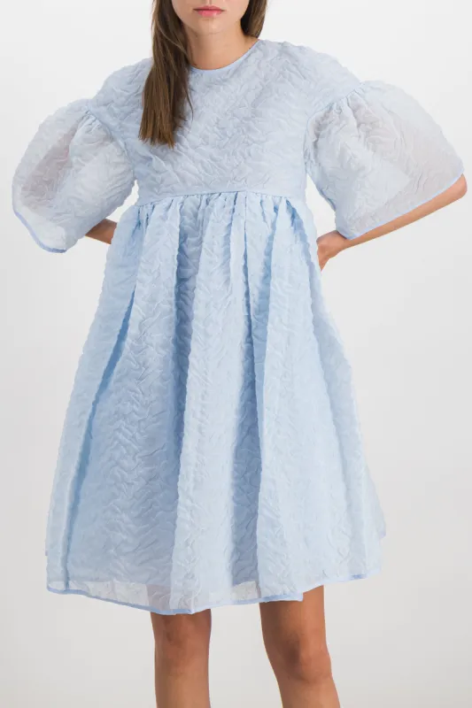Nimbus matelassé bell shaped dress with voluminous skirt sold by Renaisa