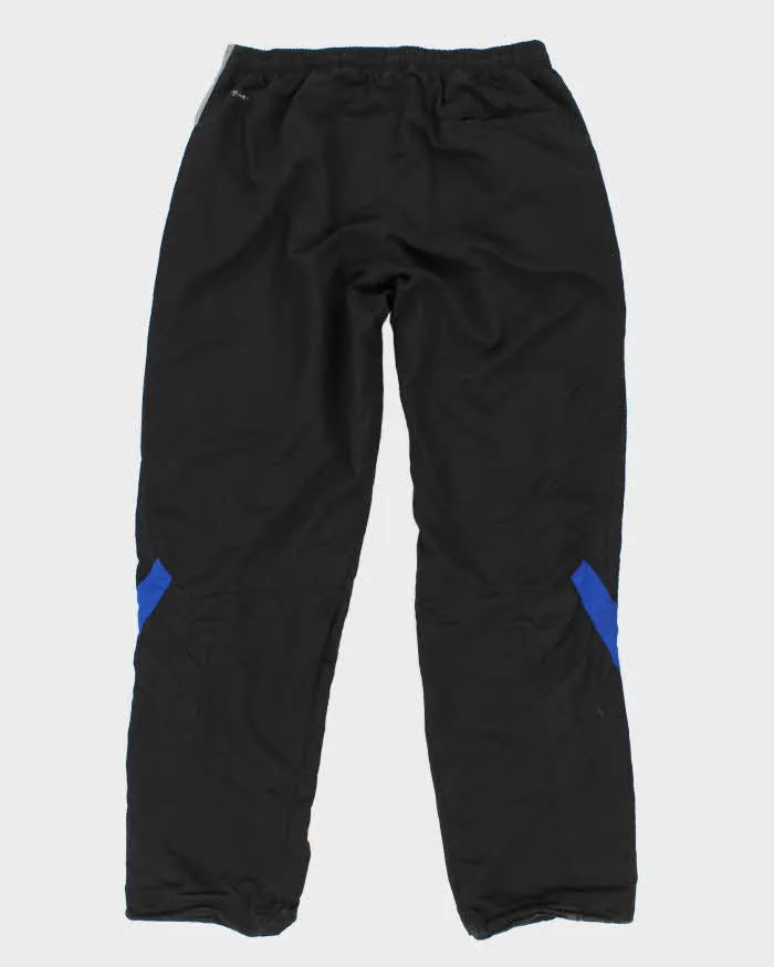 00s Reebok Track Bottoms - M sold by Rokit product image thumbnail 2