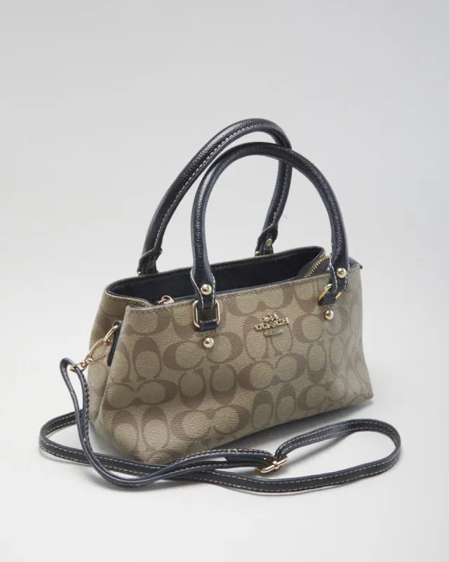 Women's Beige Coach Monogram Canvas Handbag sold by Rokit