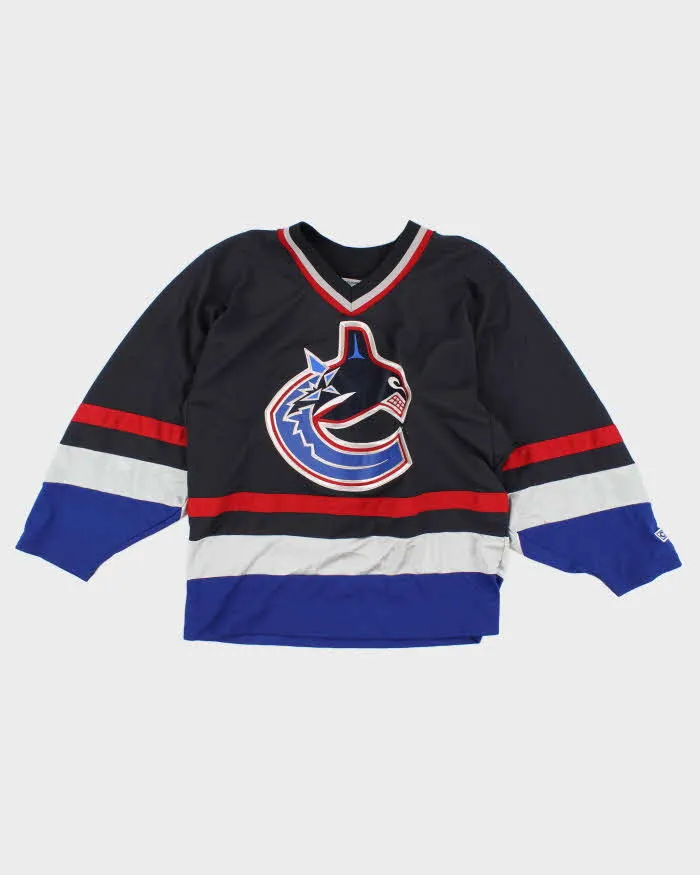 Vintage NHL x Canucks Men's Navy Jersey - M sold by Rokit