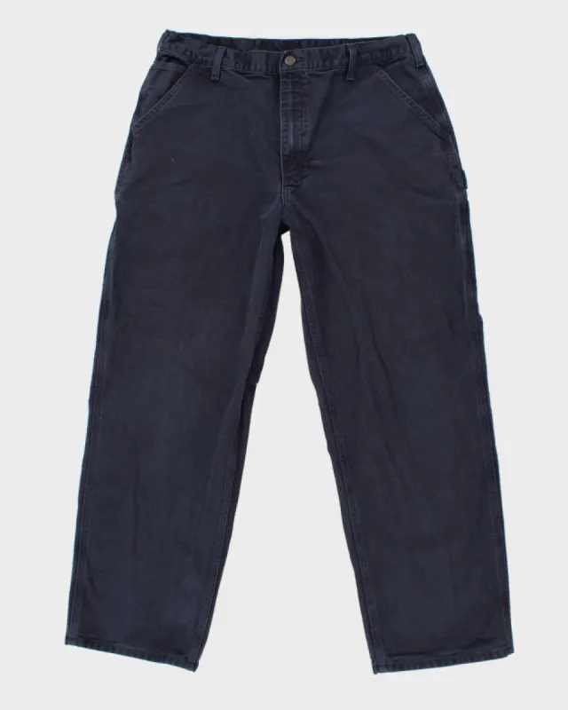 Vintage Carhartt Navy Workwear Trousers - W34 L30 sold by Rokit