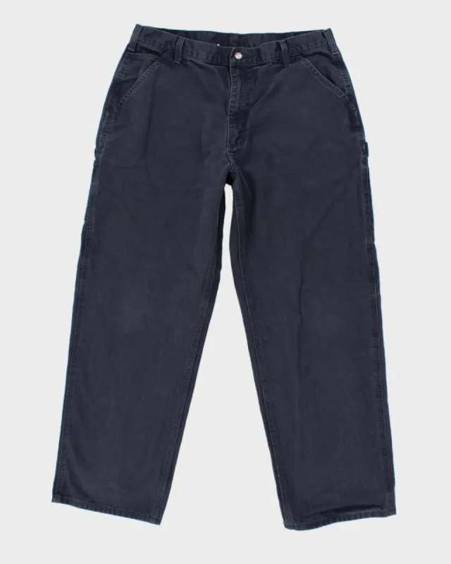 Vintage Carhartt Navy Workwear Trousers - W36 L31 sold by Rokit