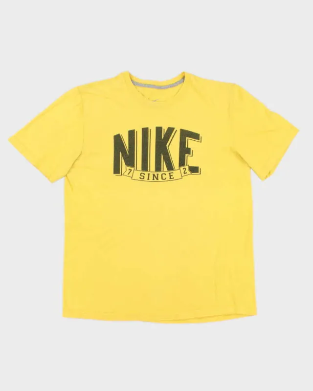 Vintage Men's Yellow Nike logo t shirt - L sold by Rokit
