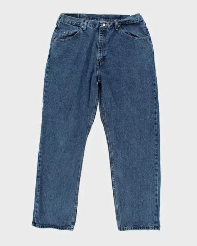 Vintage Wrangler Relaxed Fit Medium Wash Jeans - W30 L30 sold by Rokit