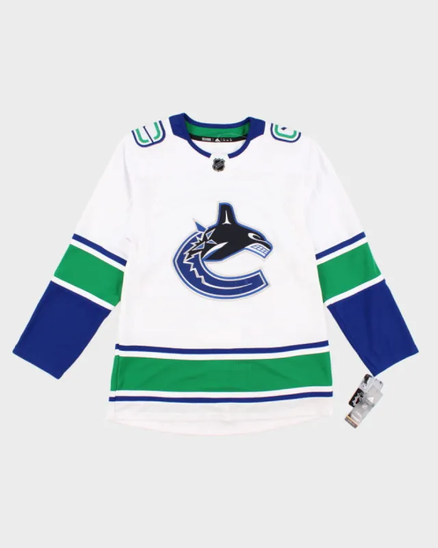 Vintage Green NHL x Calgary Canucks Sports Jersey - M sold by Rokit