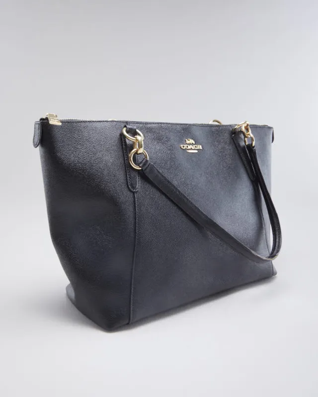 Woman's Black Coach Coated Canvas Hand Bag sold by Rokit