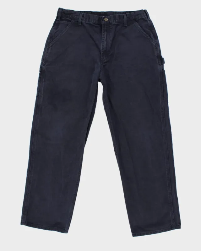 Vintage Carhartt Navy Workwear Trousers - W34 L31 sold by Rokit